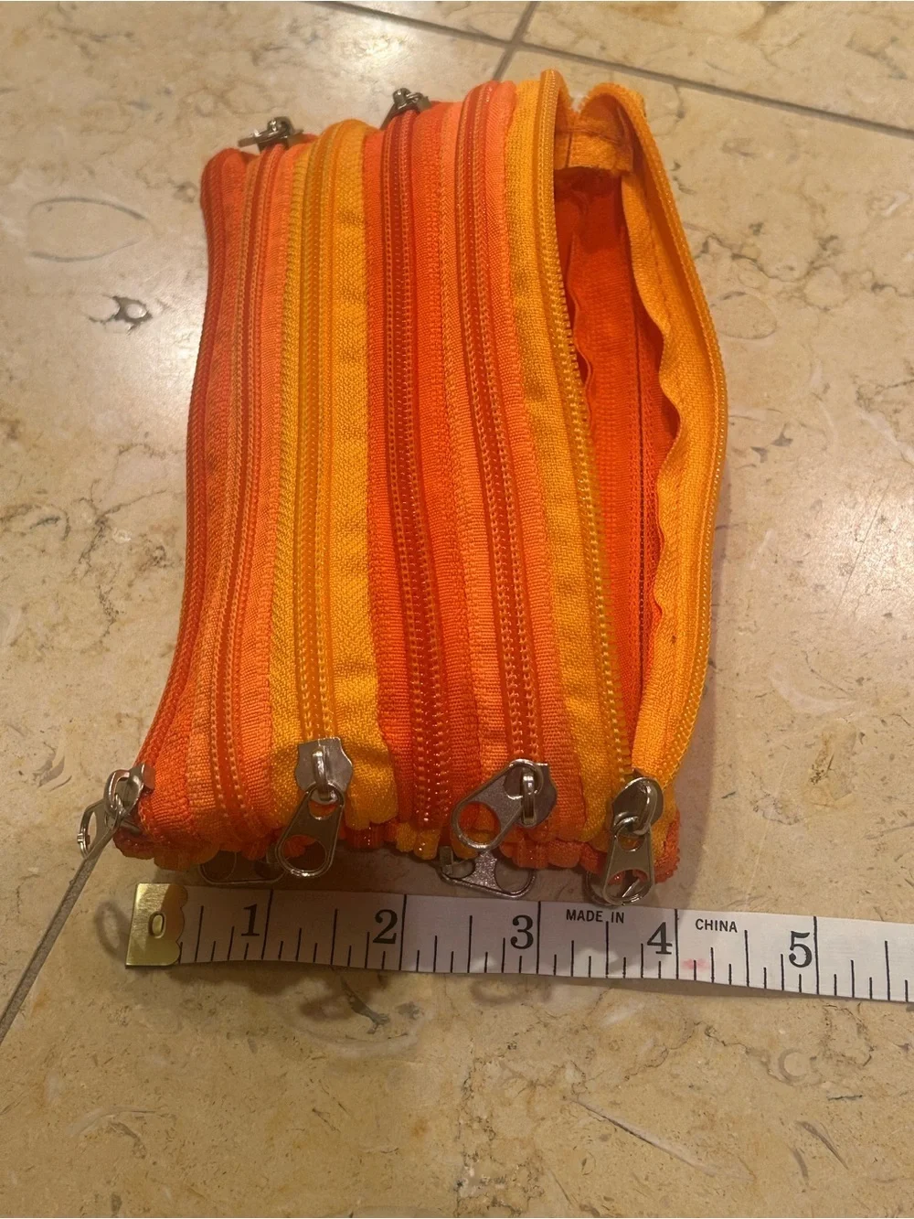 Striped Two Tone Orange 7 Zipper Pouch
